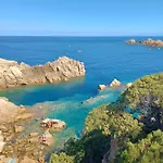 La Lecceta Surrounded By Greenery And Sea View With Sunset